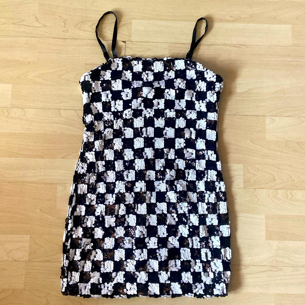 Brand new! Small Black and white sequins Lily Rose mini dress.